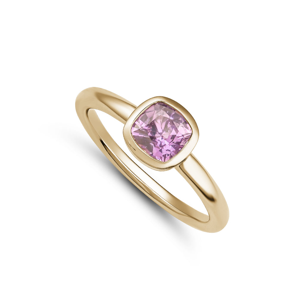14 k and 18 k yellow gold purple cushion sapphire in bezel set Carati Jewelry Montreal