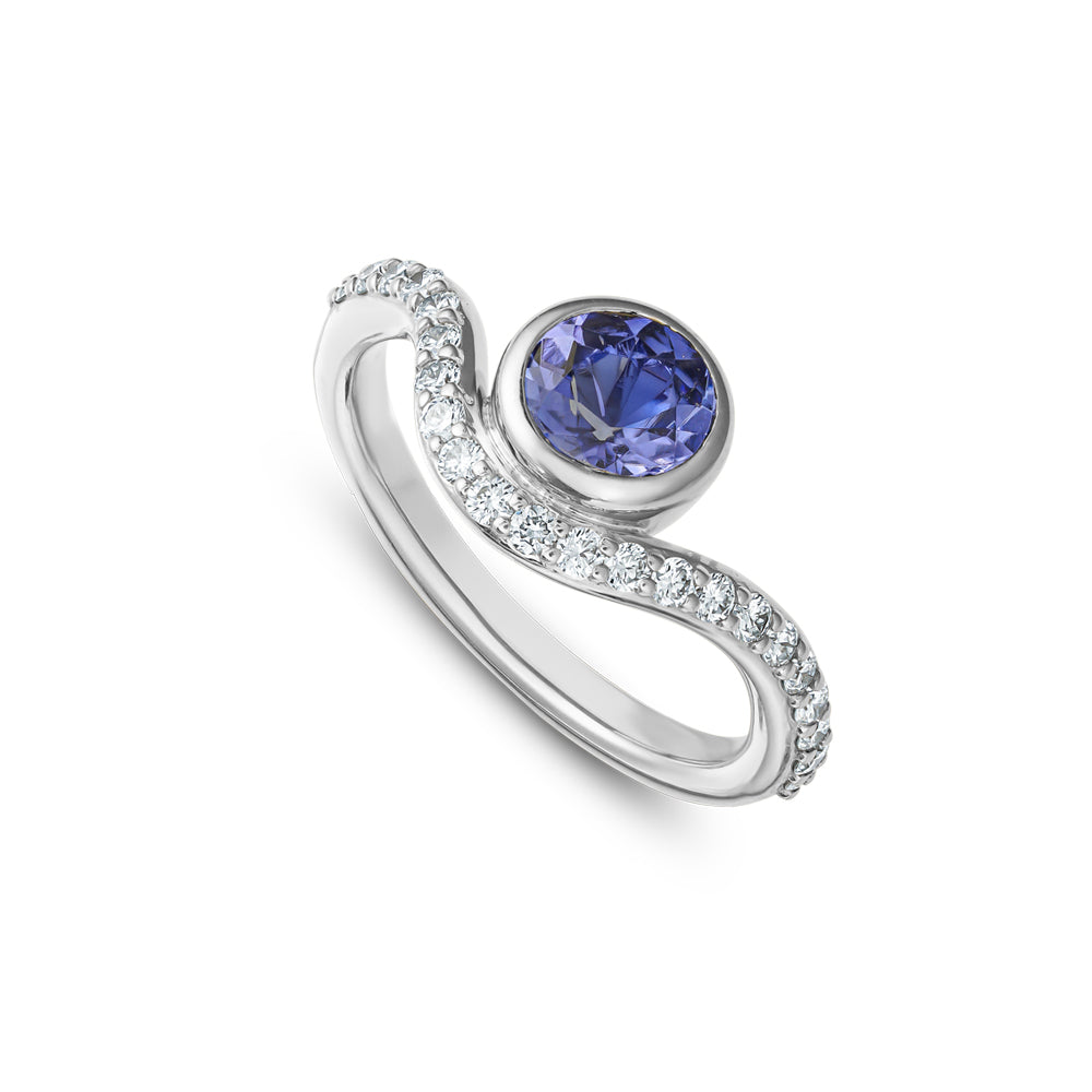 14k and 18 k white gold with round tanzanite and wavy ring set with diamonds Carati Jewelry Montreal