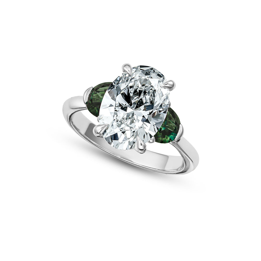 3 ct oval diamond with 2 moon sapphires in 18k white gold Carati jewelry montreal