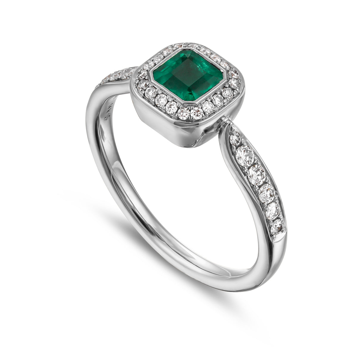 Royal harmony ring with tie emerald surrounded by pave diamonds and on the shank designed by carati jewelry in montreal canada 18k 14 k