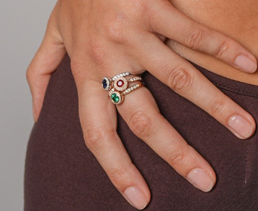 Royal Harmony Ring Centered an Emerald and Diamonds on Shank