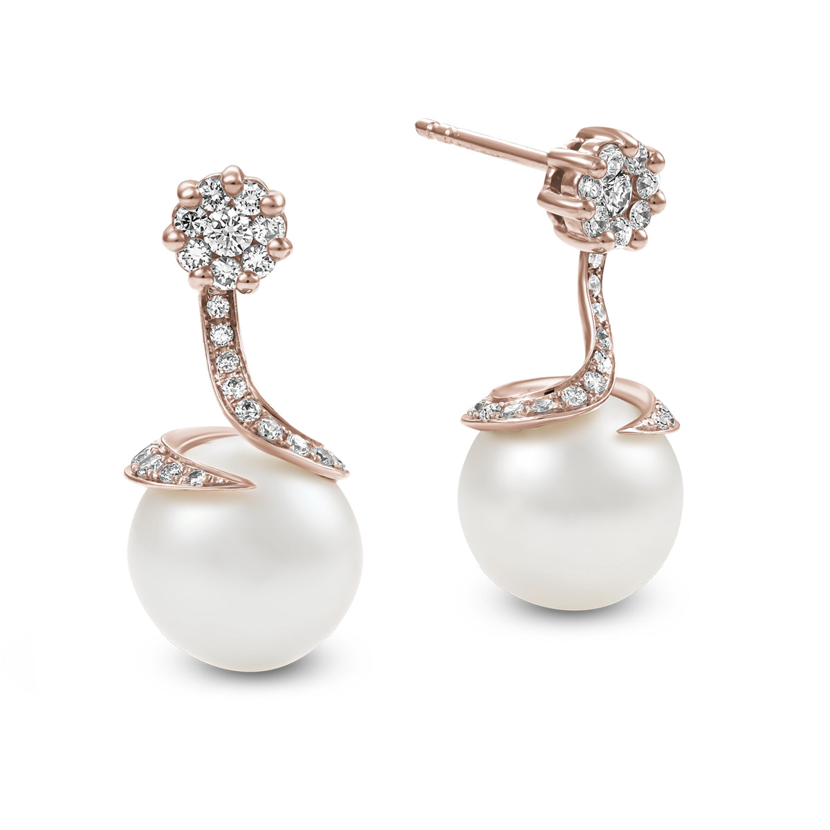 Spirale earrings with natural south sea pearl with pave set diamonds in spirale design ,designed by carati jewelry montreal canada 18 k 14 k