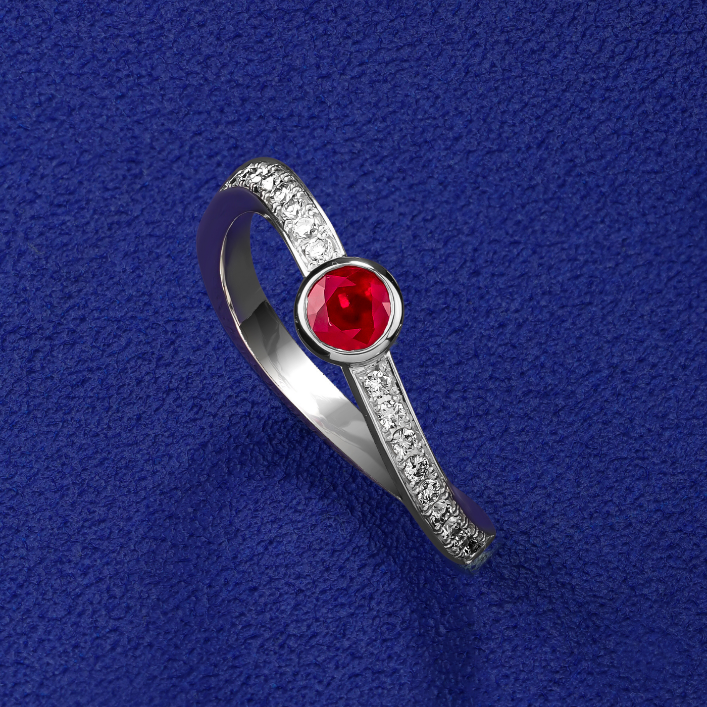 single Wavy Ring with a Ruby in the middle and diamonds set in pave , iconic design by carati jewelry in montreal canada in 18k 14k with blue backround and zoomed