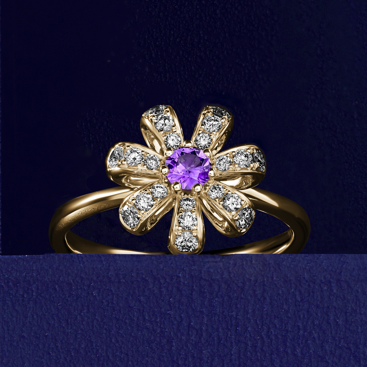 Fiora Ring set in pave Diamonds and a Sparkling Purple Sapphire sapphire in the middle is iconic design from carati jewelry in montreal canada in 1k 14 k in blue backround and zoomed
