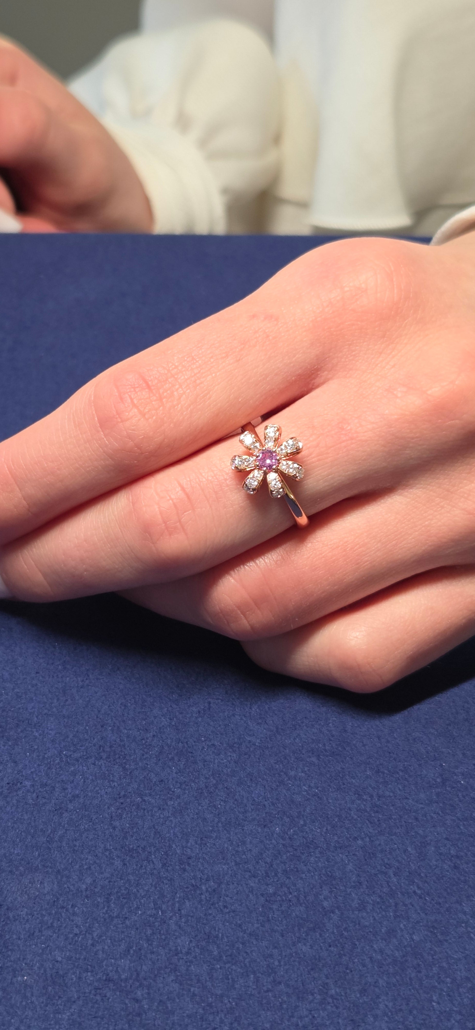 Fiora Ring set in Diamonds and a Dazzling Sapphire