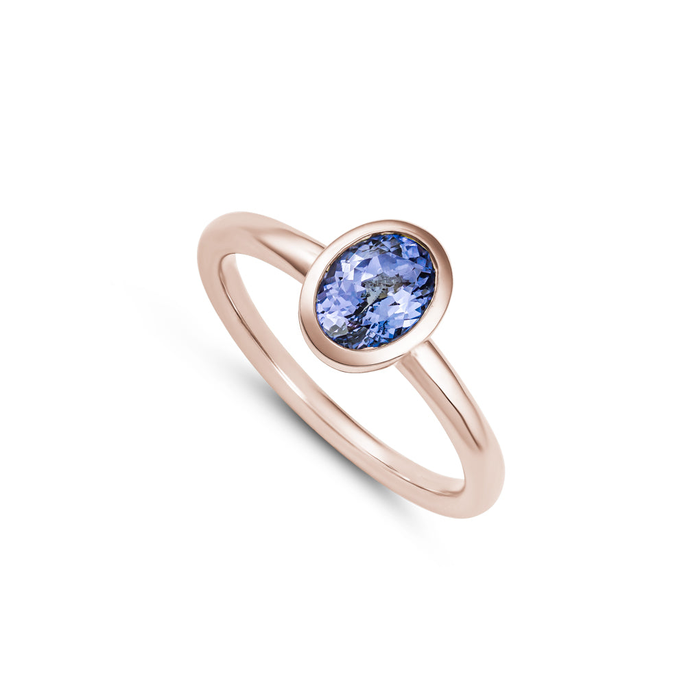 14k and 10 k rose gold bezel set in tanzanite gemstone Carati jewelry montreal 