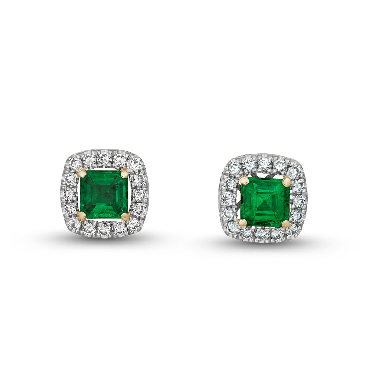 A pair of square-shaped emerald earrings with halo sets of sparkling diamonds around each emerald designed by carati jewelry in montreal canada in 18 k 14 k in 2 tone 