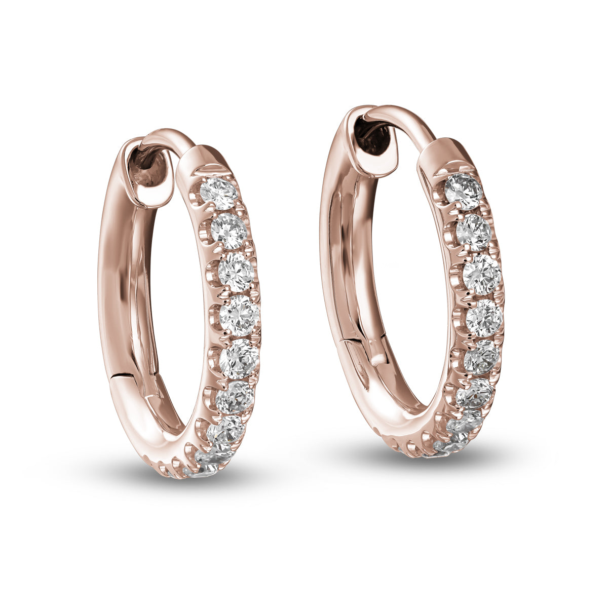 pair of Hoops earring set in diamonds designed by carati jewelry montreal canada 18 k 14k