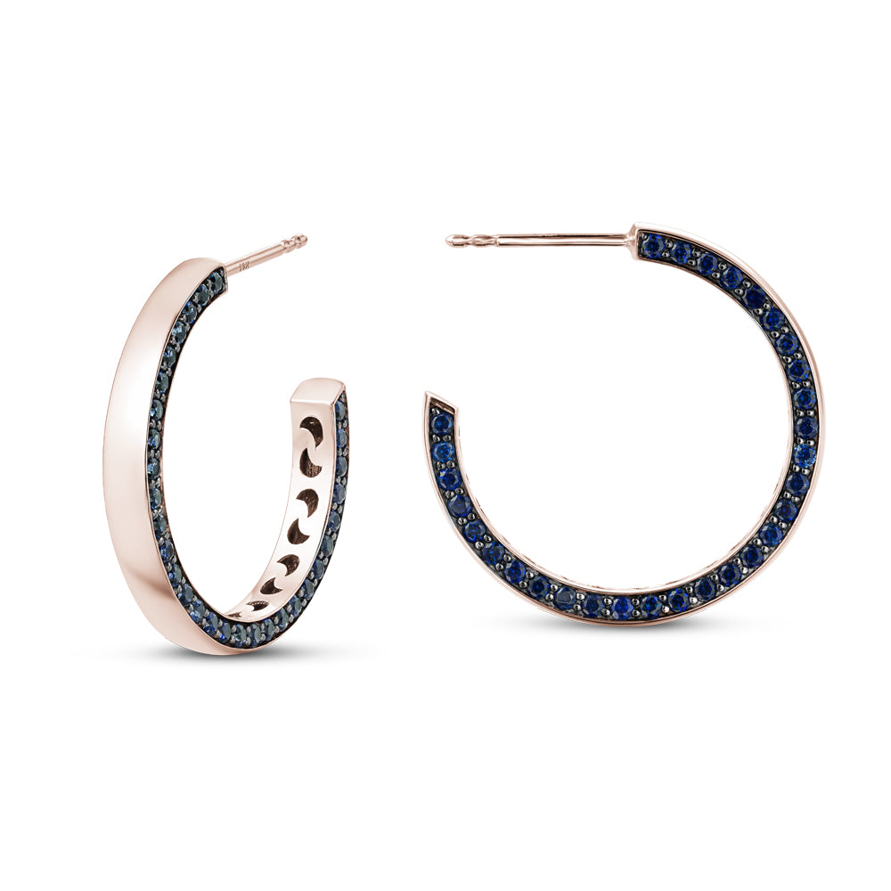 14 k rose gold eclipse earring set with blue sapphires on one side designed carati jewelry montreal