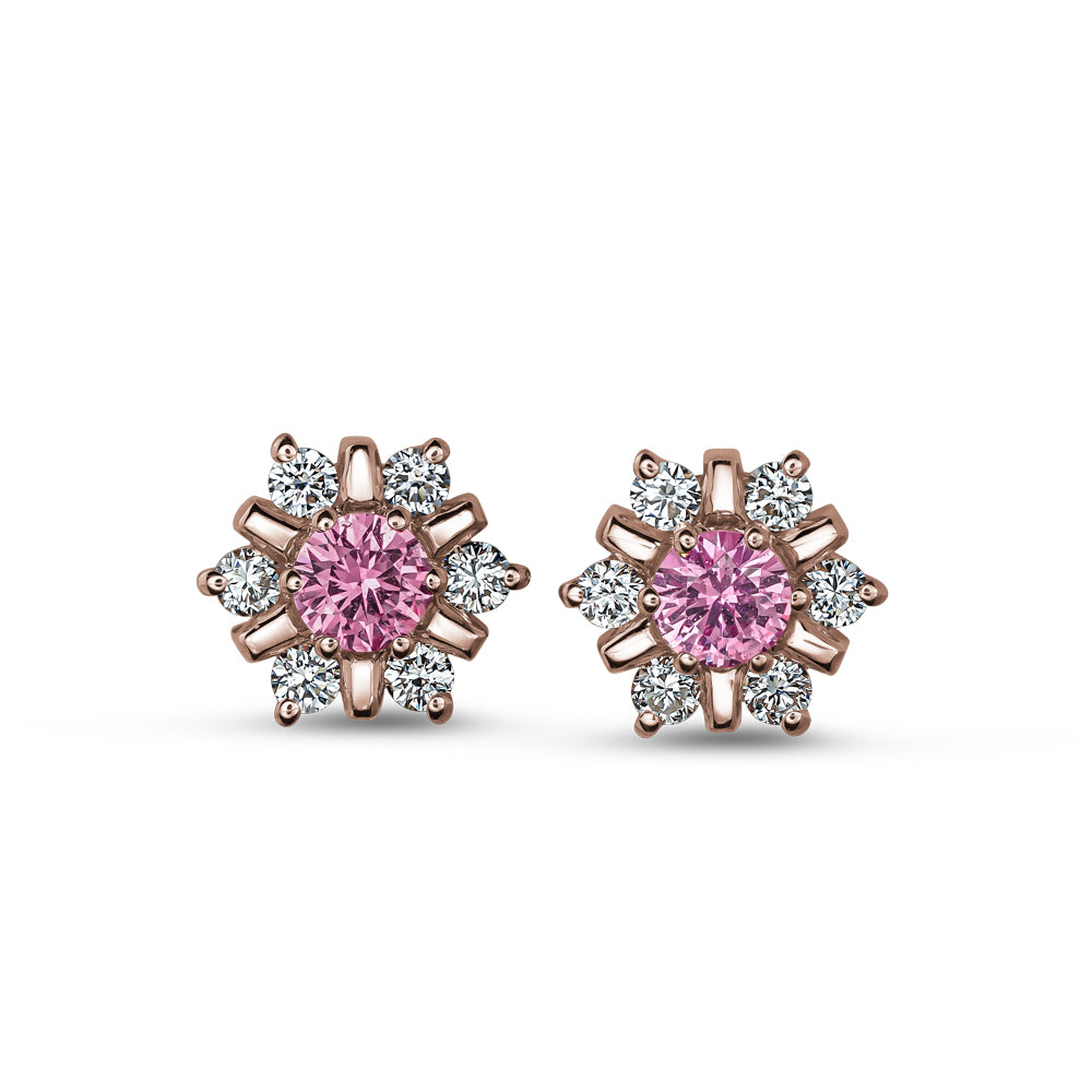 18 K rose GOLD snowflake design set center a pink  sapphire and surrounded in diamonds carati jewelry montreal