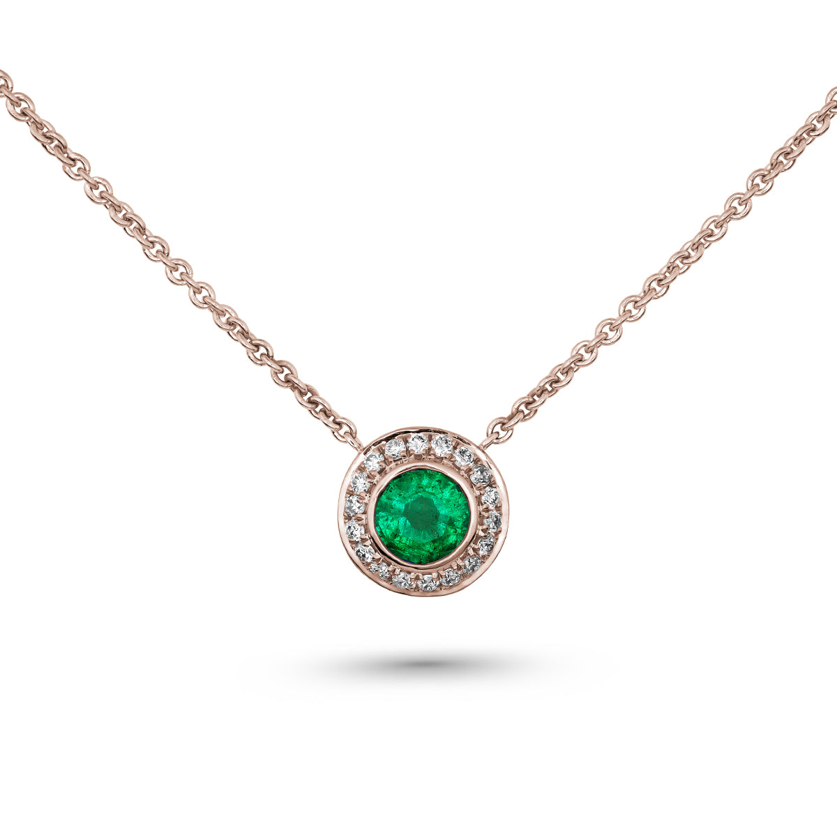 Royal Harmony pendant Centered Around a stunning emerald set all around pave in diamonds designed by carati jewelry in montreal canada in 14 k 18 k