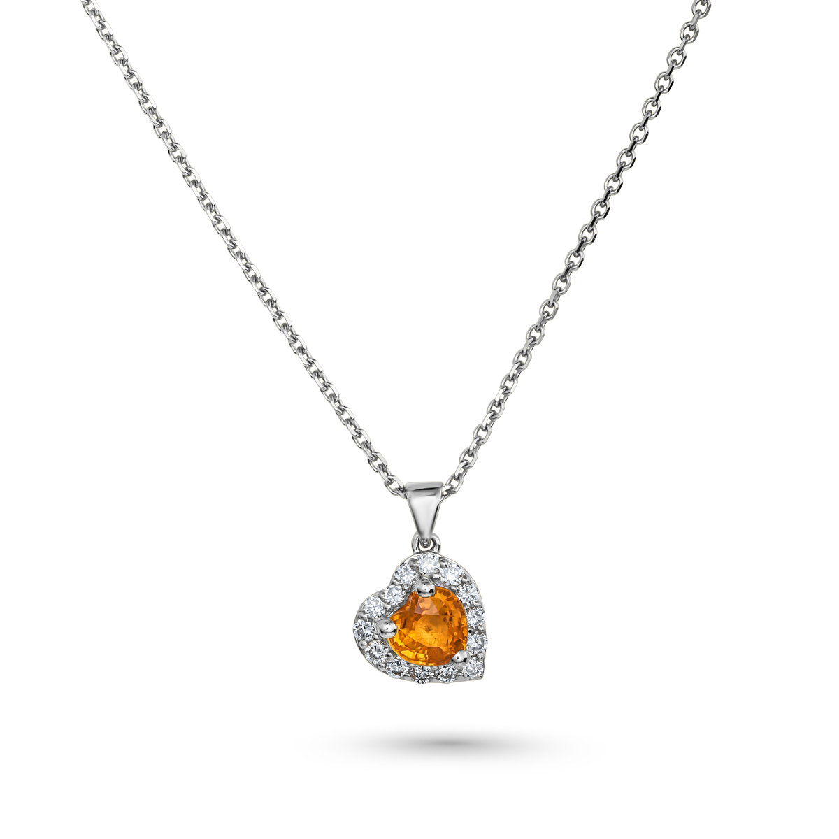 Heart-shaped pendant with orange gemstone on a white background
sapphire gifts anniversarry gold chain pendants heart designed by carati jewelry 14 k 18 k 
