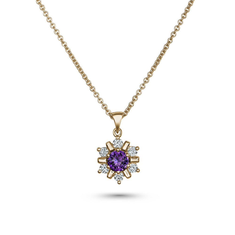 18k yellow gold snowflake pendant with purple sapphire in the middle and  set around  in diamonds carati jewelry montreal