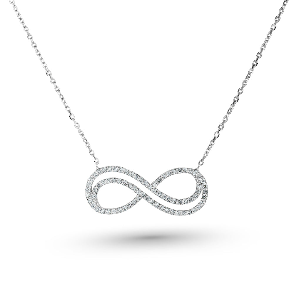 Infinity pendant in 14 k white gold  set with micro diamonds carati jewelry montreal