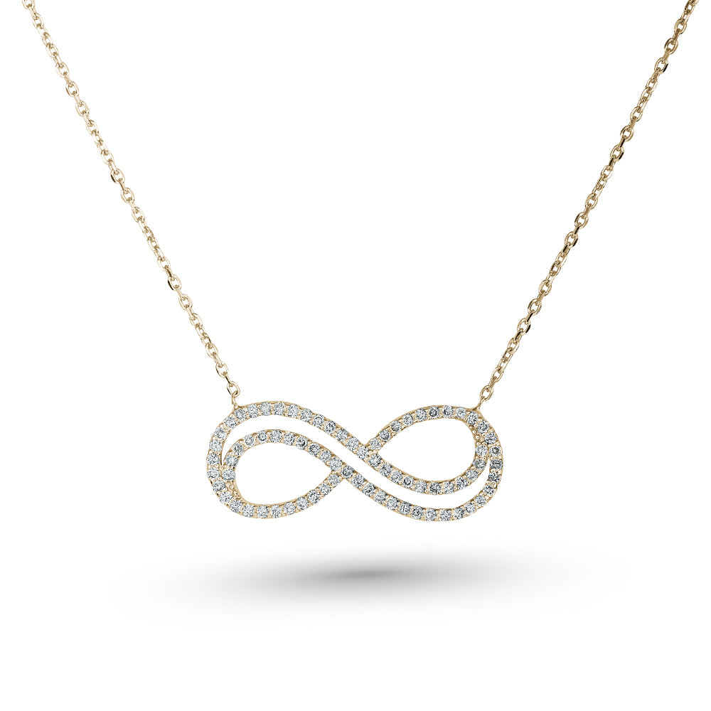 Infinity pendant in 14 k yellow gold  set with micro diamonds carati jewelry montreal