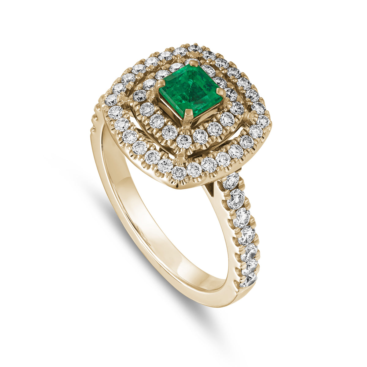 A square emerald set in two tone in a double halo ring with a setted shank designed by carati jewelry in 14k 18 k in vs diamonds