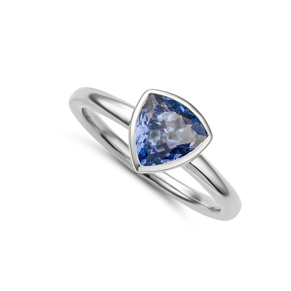 14k and 18k white gold trillion shaped tanzanite bezel set from Carati Jewelry montreal