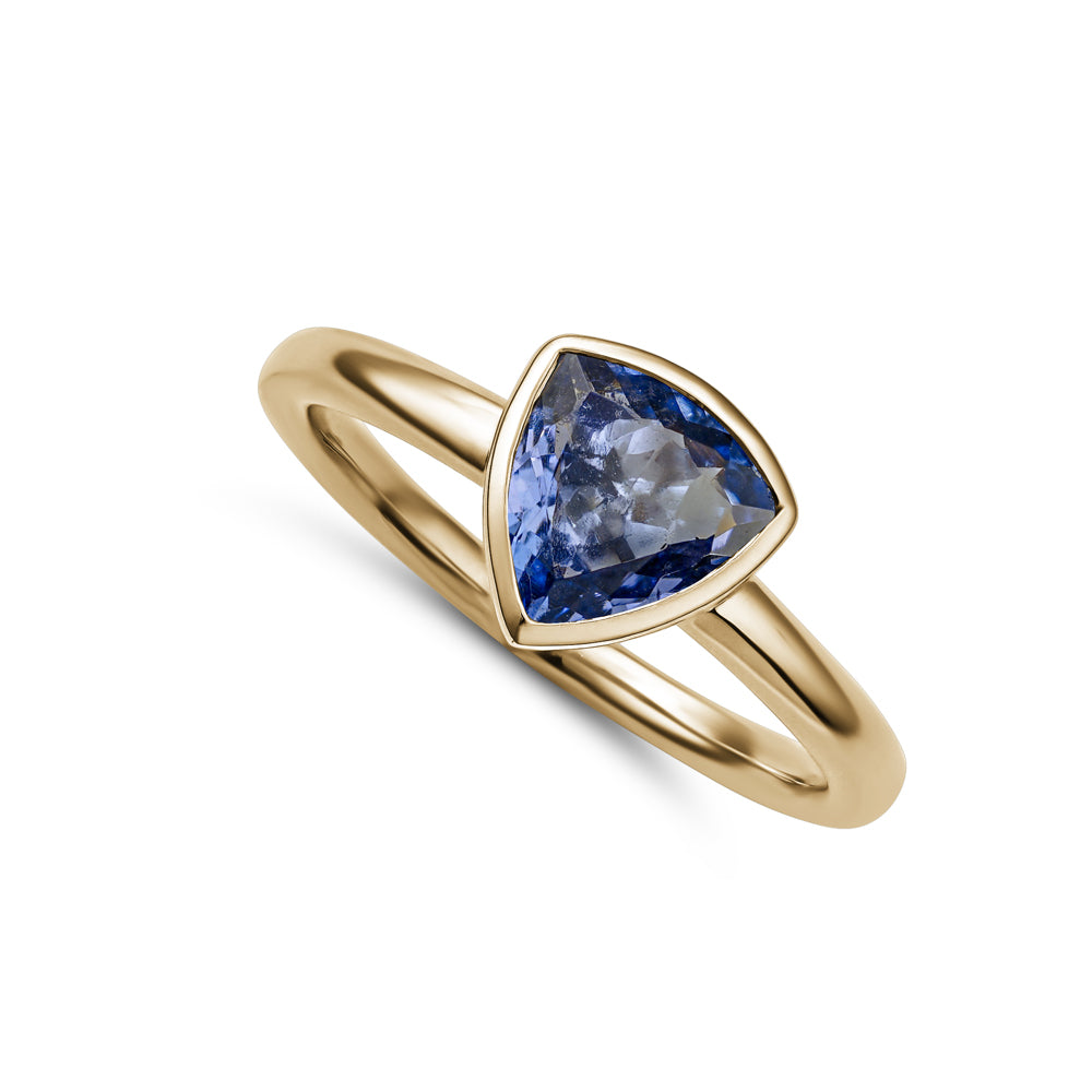 14k and 18k yellow gold trillion shaped tanzanite bezel set from Carati Jewelry montreal