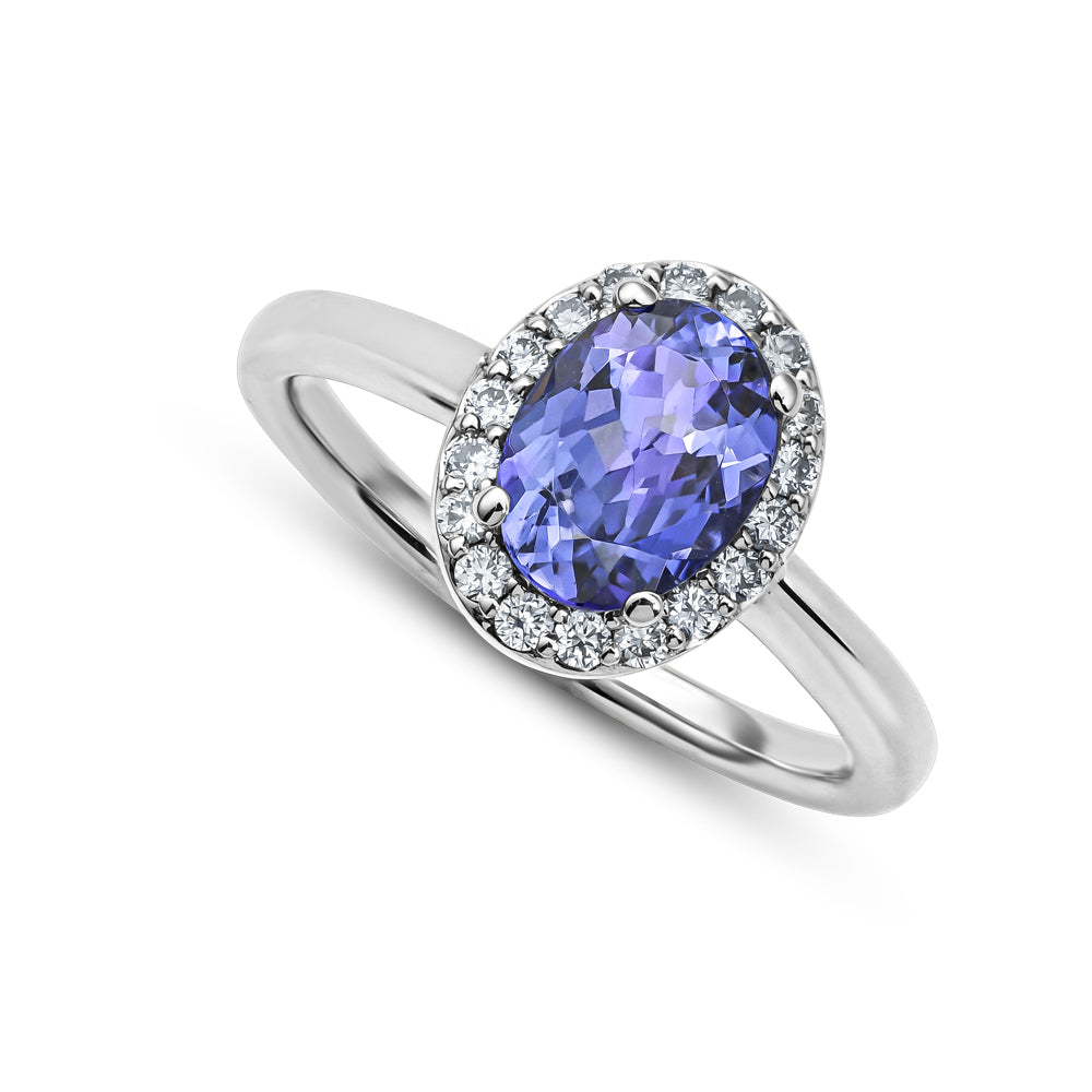 14k and 18k white gold oval tanzanite and halo set in diamonds carati jewelry montreal