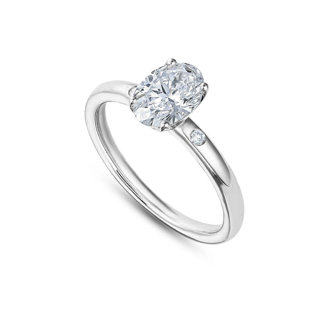 14 k  white gold 1 ct oval engagement ring with 2 side diamonds carati jewelry montreal