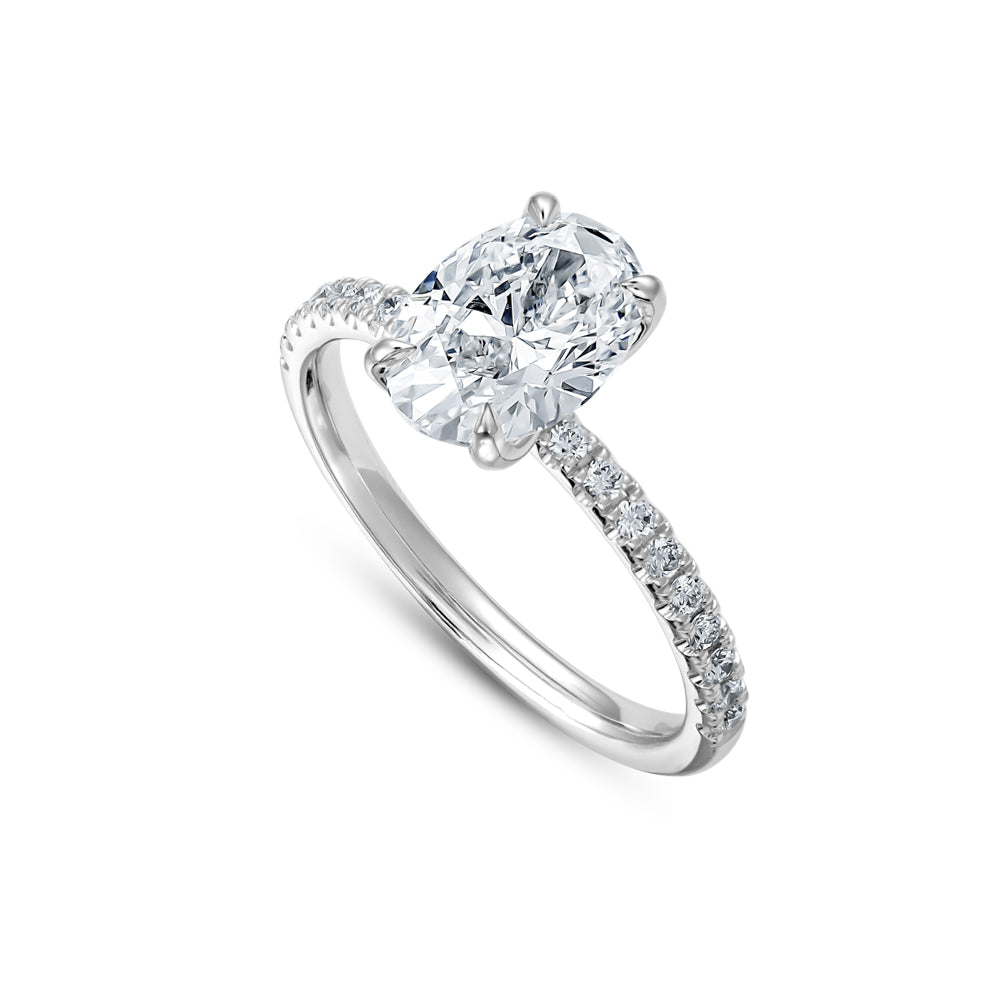 14 k white gold Oval Engagement Ring Set In Petal Prongs And Side Pave carati jewelry montreal