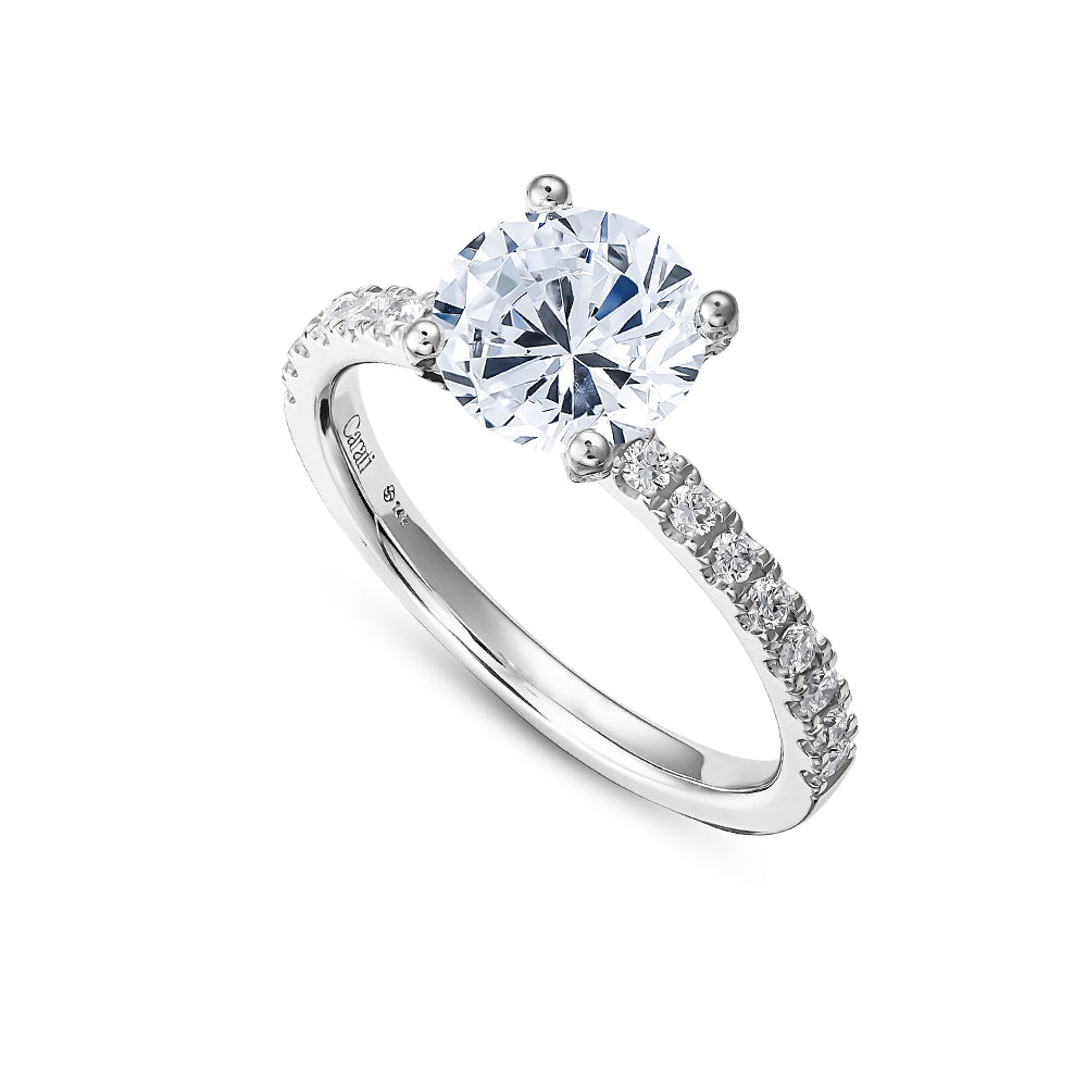 14 k white  gold Round Engagement Ring With Diamonds On Both Prongs And Shank carati jewelry montreal
