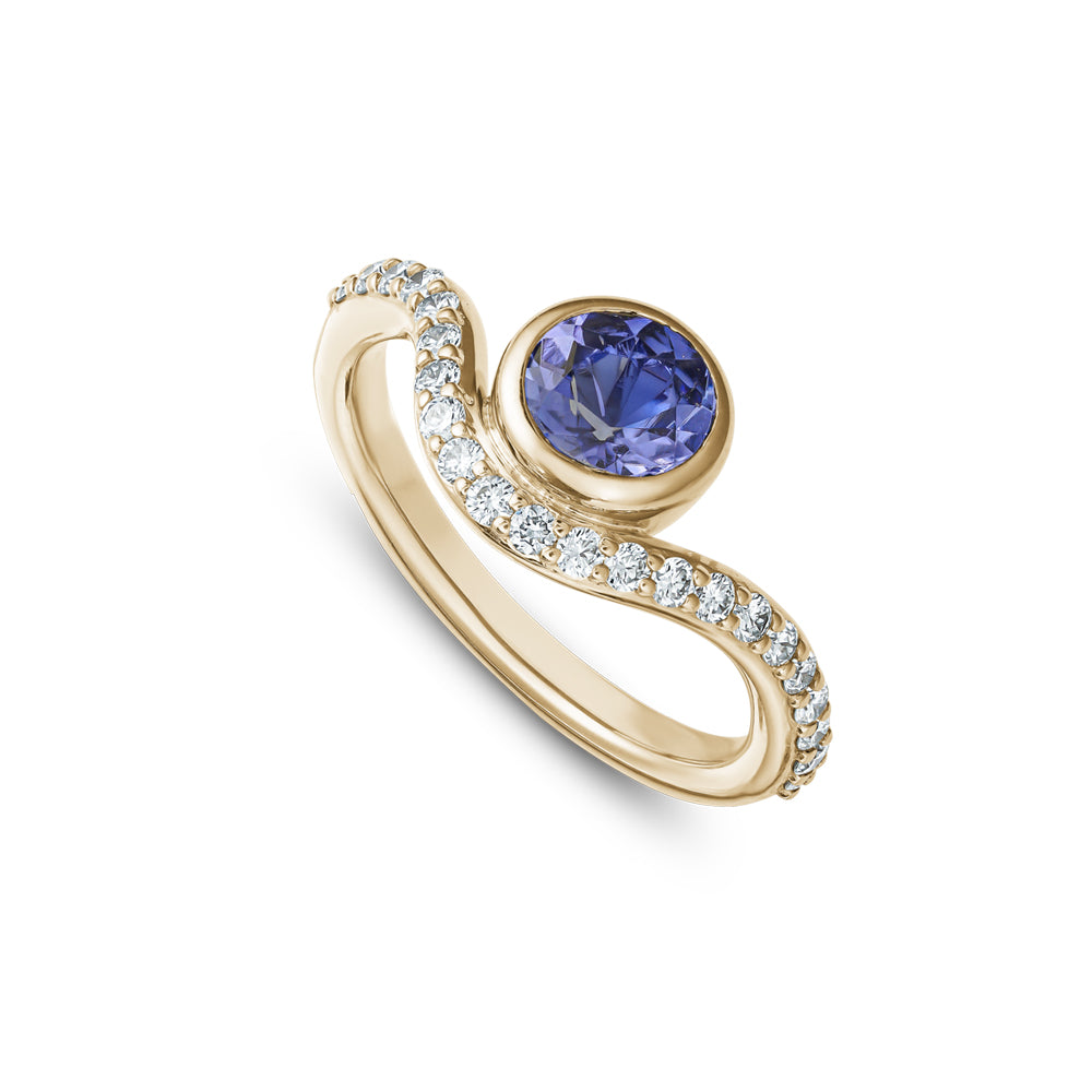 14k and 18 k yellow gold with round tanzanite and wavy ring set with diamonds Carati Jewelry Montreal