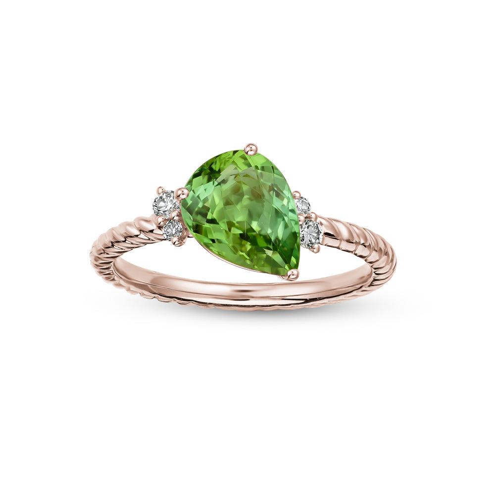 18k rose gold on this green toumaline on twisted shank with diamonds Carati jewelry Canada