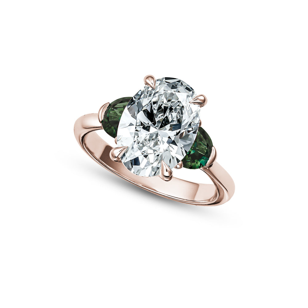 3 ct oval diamond with 2 moon sapphires in 18k rose gold Carati jewelry montreal