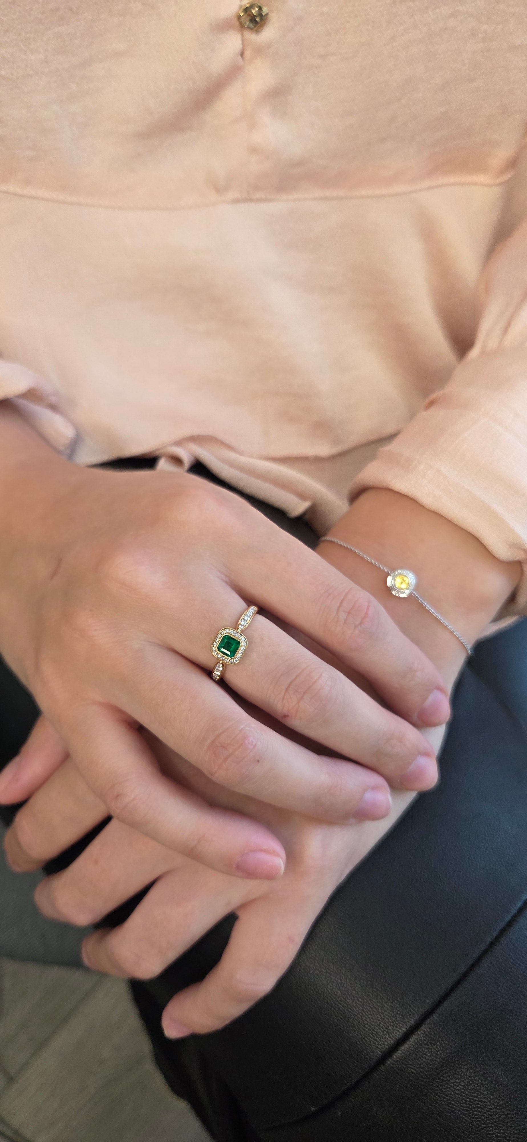 Royal Harmony Ring Centered with a Stunning Emerald
