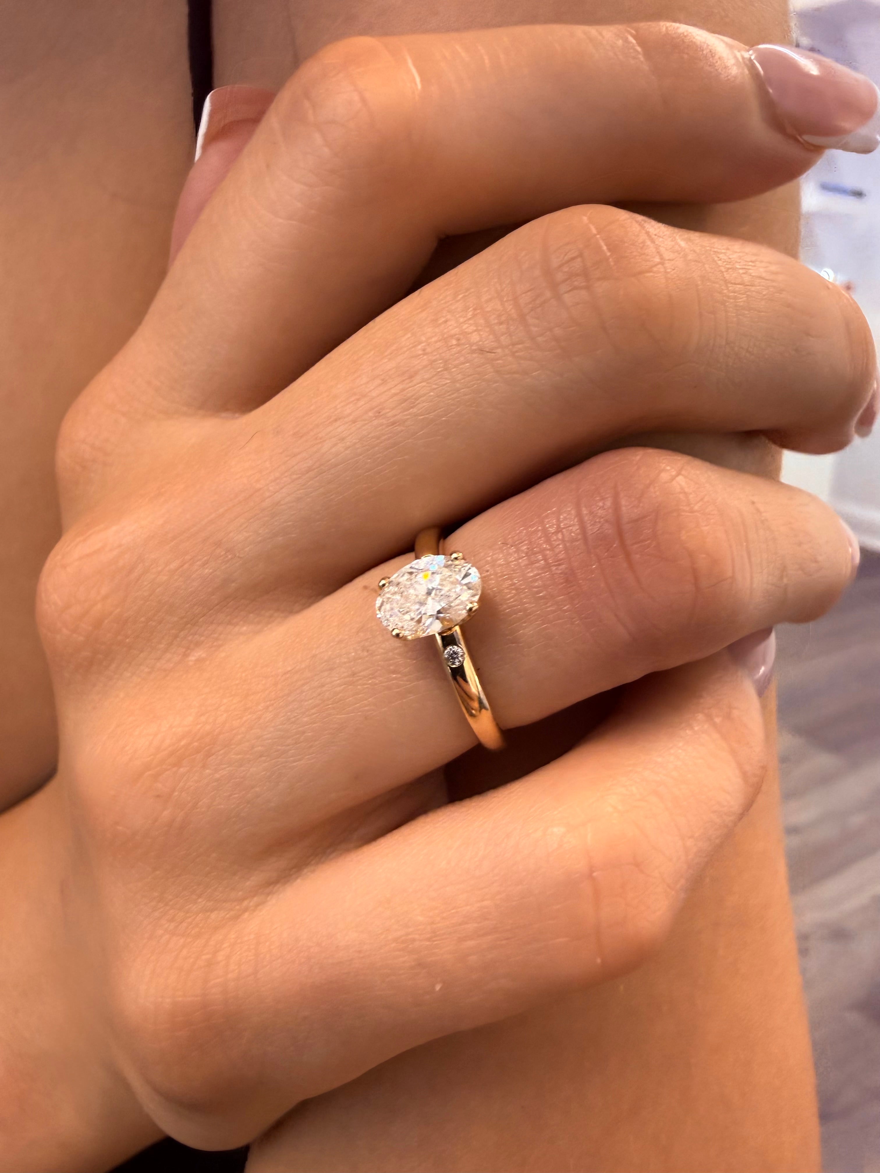 Oval Engagement Ring With 2 Side Diamonds