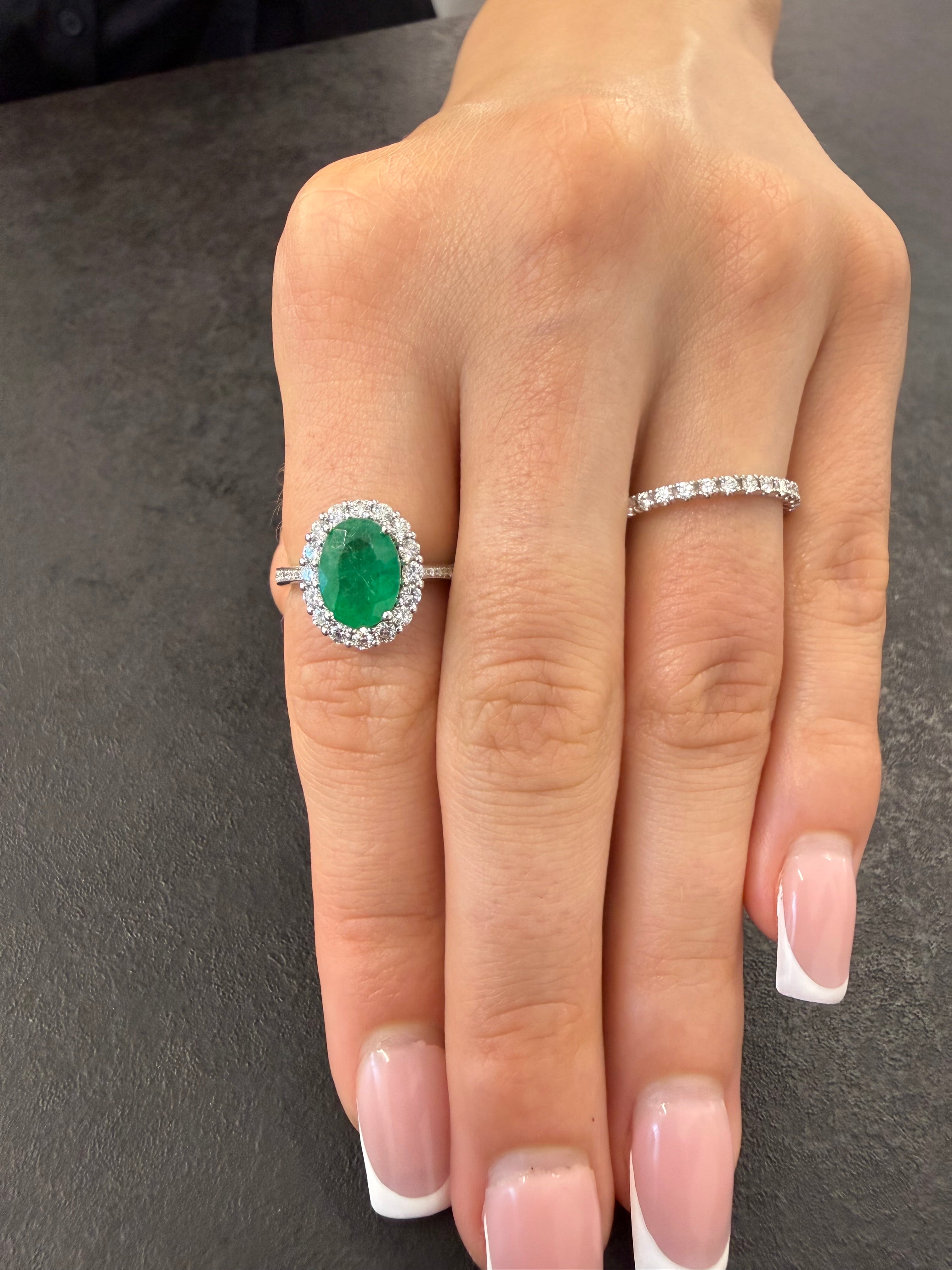 Oval Emerald Engagement Ring Set all Around Diamonds