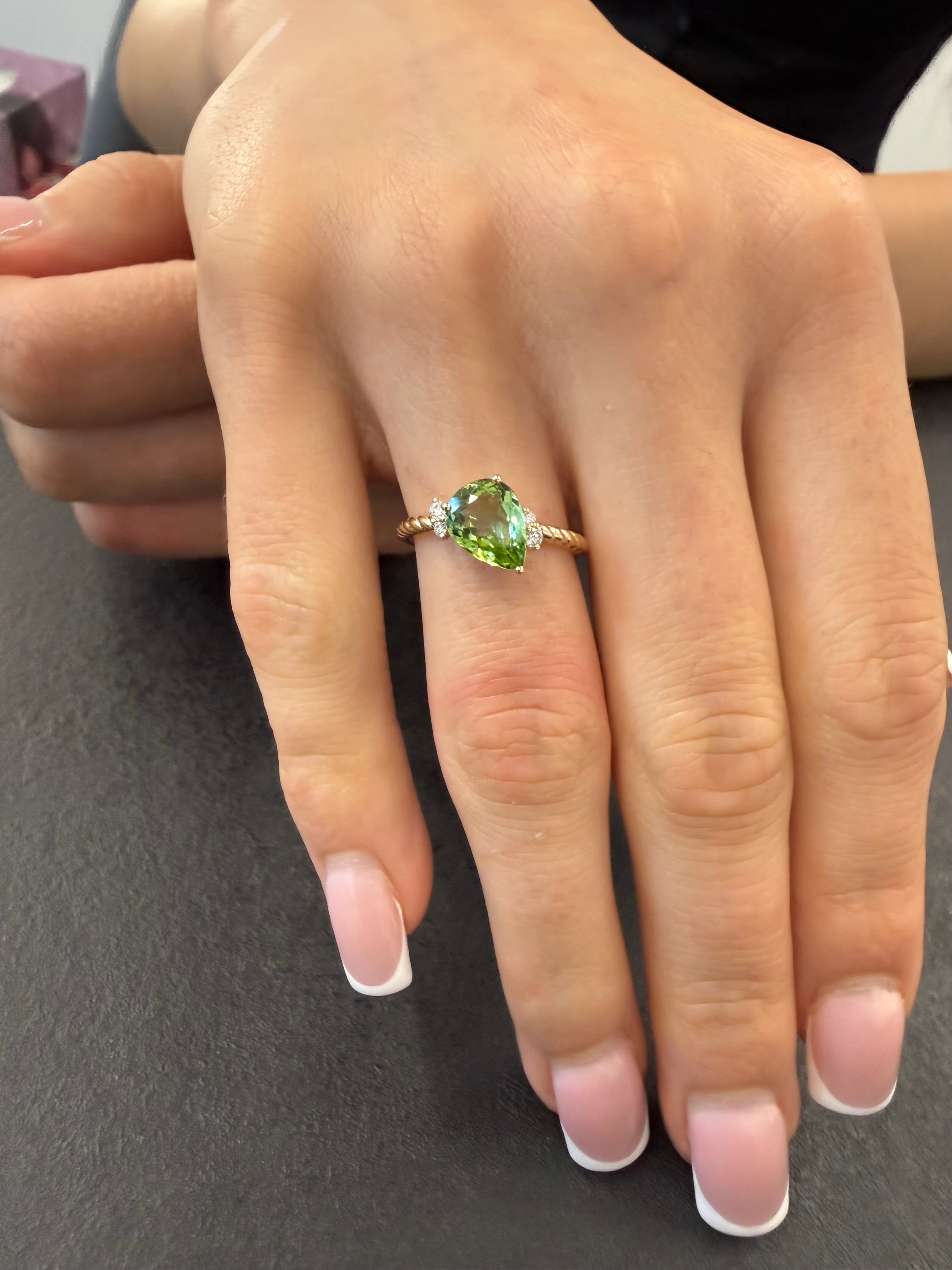 Green Pear Tourmaline Set On Twisted Shank With Sparkling Diamonds